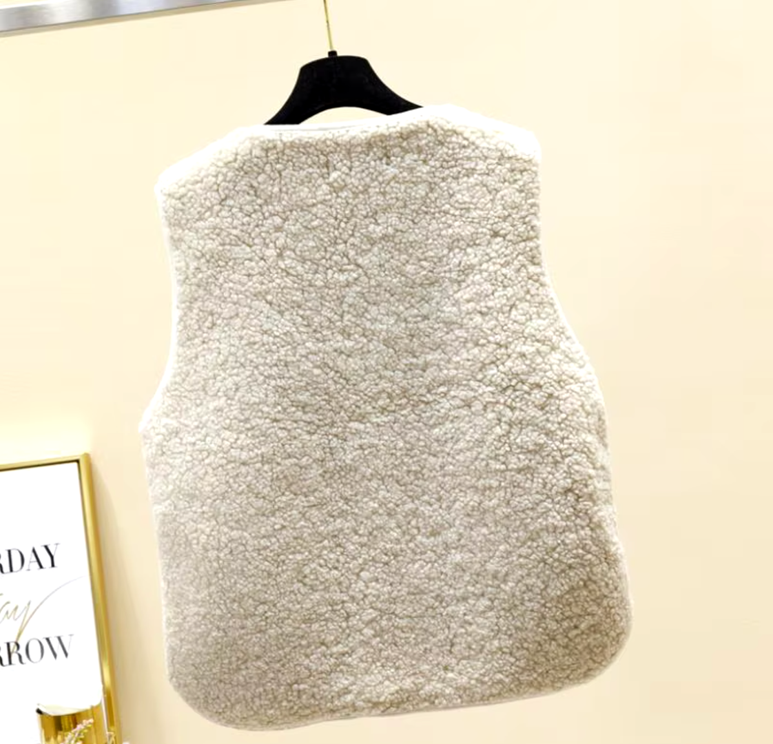 Damska zimowa kamizelka polarowa z kieszenią